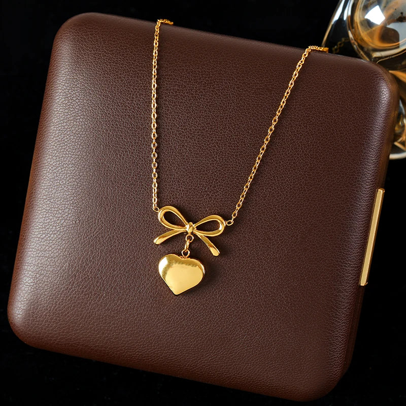 Conjunto de Collar y Pendientes, diseño Lazo y Corazón (Opciones de solo pendientes o collar)