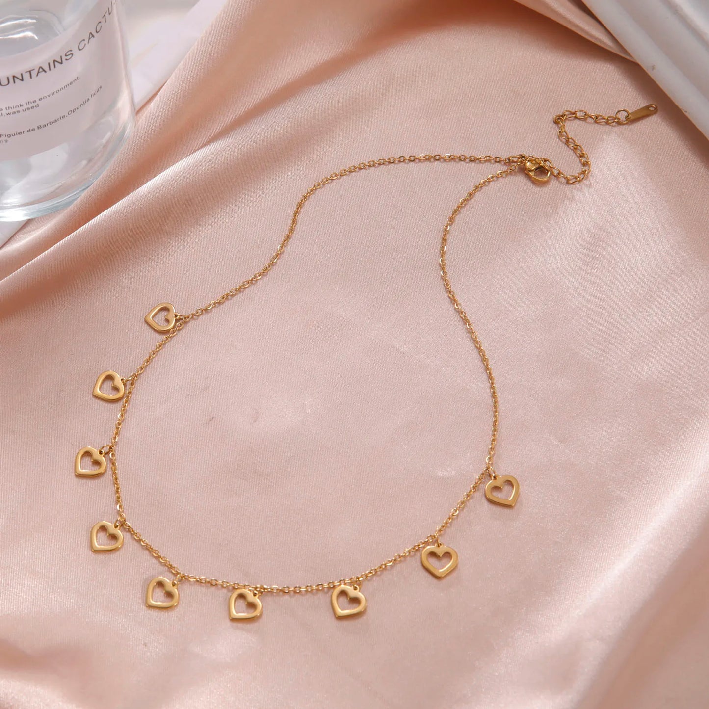 Collar de acero inoxidable, colgantes de corazones