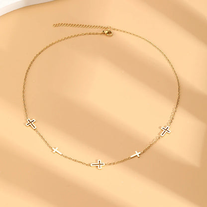 Collar de acero inoxidable con múltiples dijes de Cruz