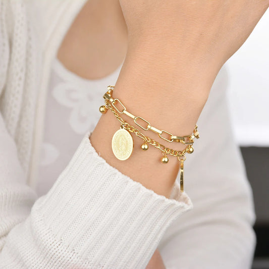 Pulseras de acero inoxidable, variedades dijes Virgen de Guadalupe y modelos con cruces